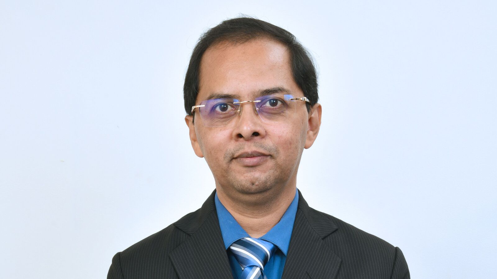 Stocks to buy or sell: Dharmesh Shah of ICICI Sec suggests buying Adani Ports, BEL shares on 1 December 2025