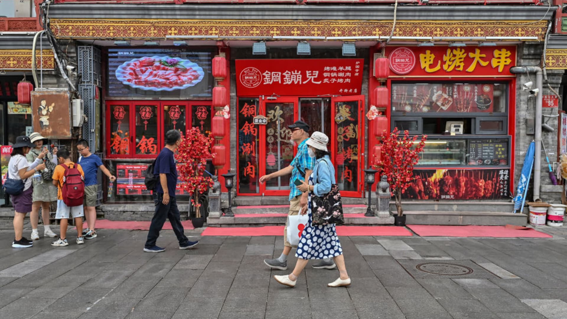China's consumer inflation hits near two-year high as producer deflation deepens more than expected