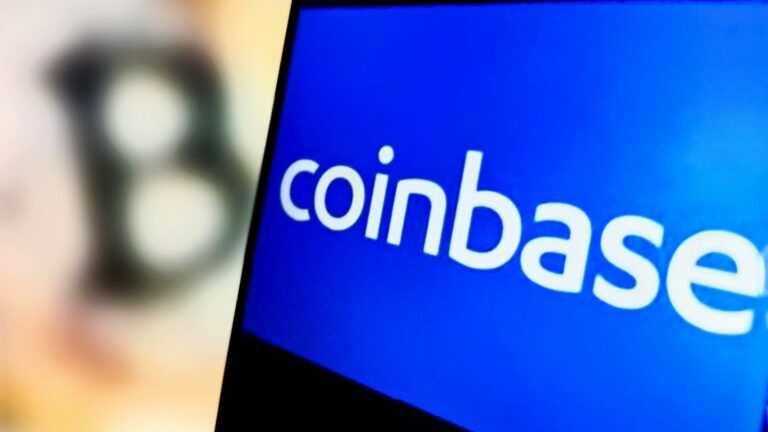 Stocks making the biggest moves midday: Coinbase, Arista Networks, Chevron, Halliburton & more