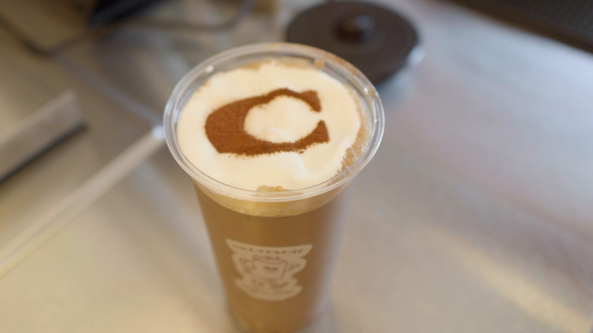 Uniqlo and Coach are opening cafes — joining longtime coffee players Ralph Lauren and Capital One. Here's why it's become a retail trend