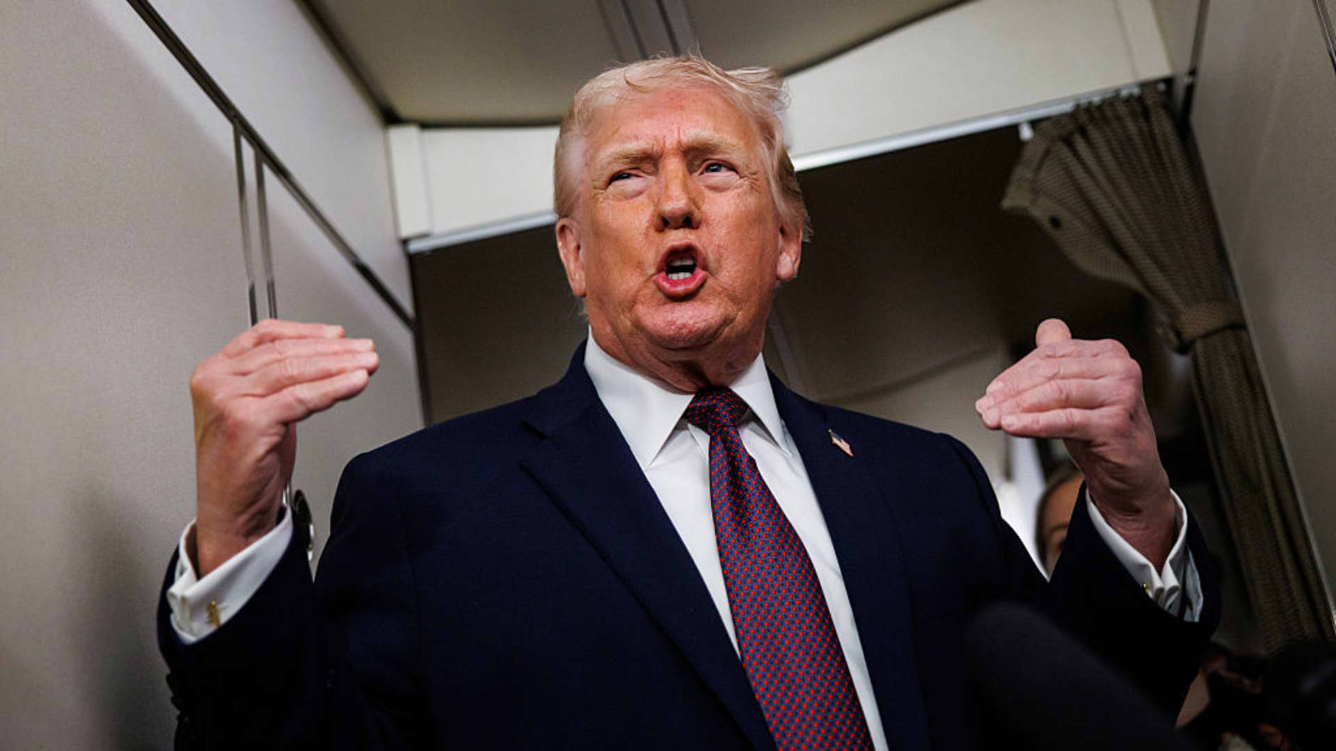 Wall Street says Trump's doing all he can to run economy hot going into the midterms. How to trade it