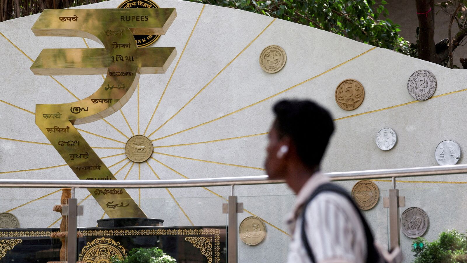 Rupee slips to record low of  92.00 against US dollar. Where is INR headed now? | Stock Market News