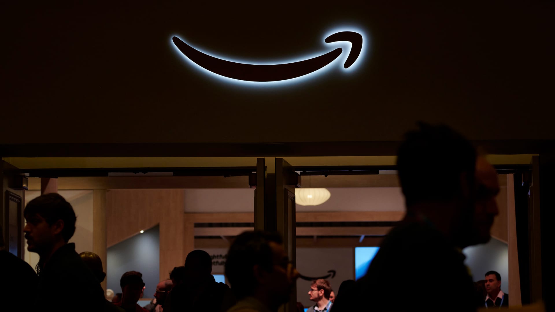 Stocks making the biggest moves midday: Amazon, Canada Goose, Estee Lauder, Qualcomm & more