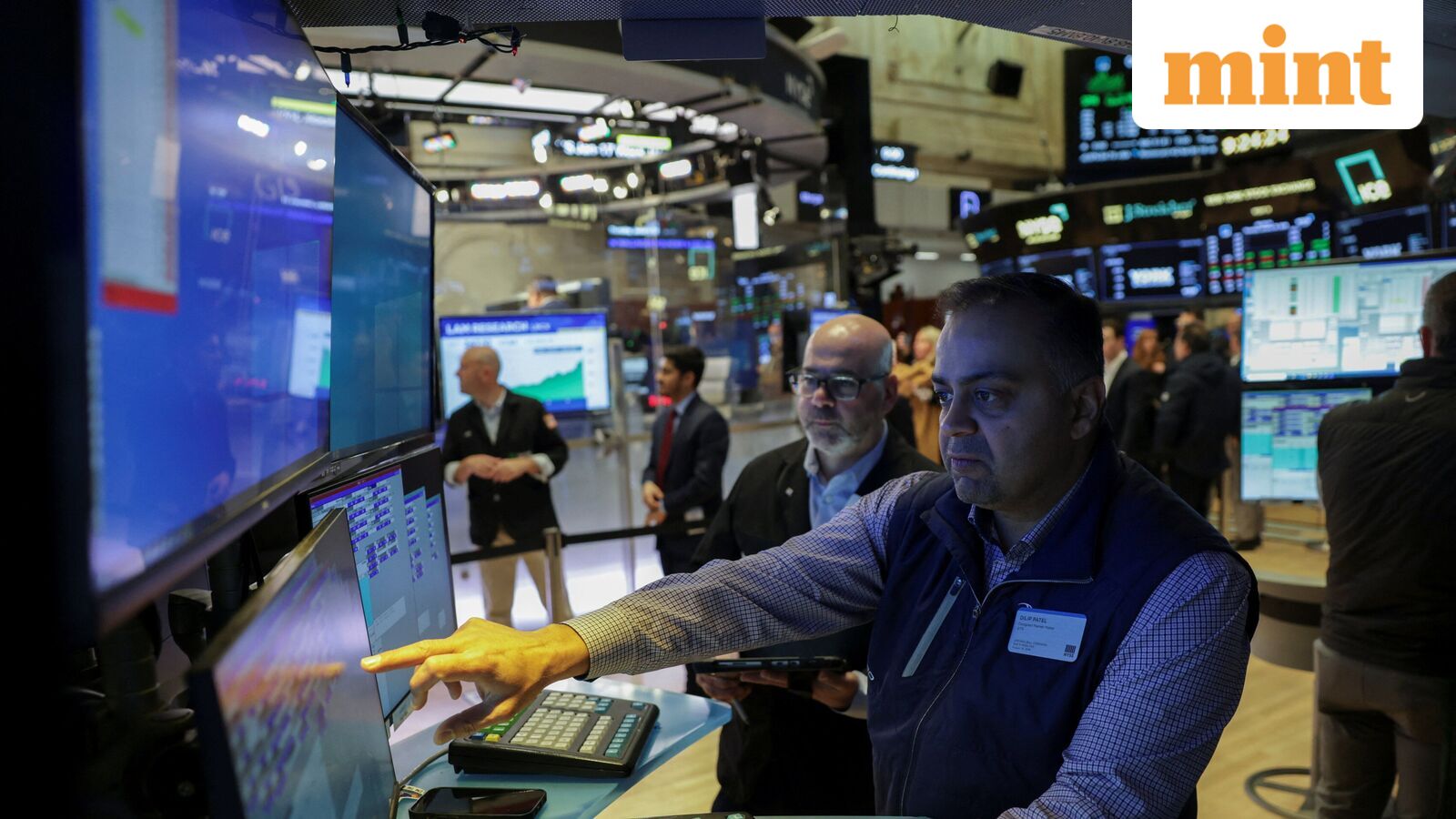 Wall Street rises after selloff in precious metals, Nvidia falls 1%, Tesla drops over 2%, Disney sheds 6%