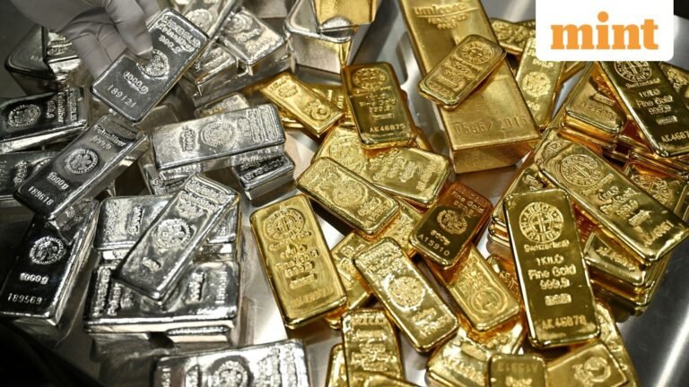 Gold, silver rates today: Gold rate holds above $5,000, silver price near $82. Where are metals headed?