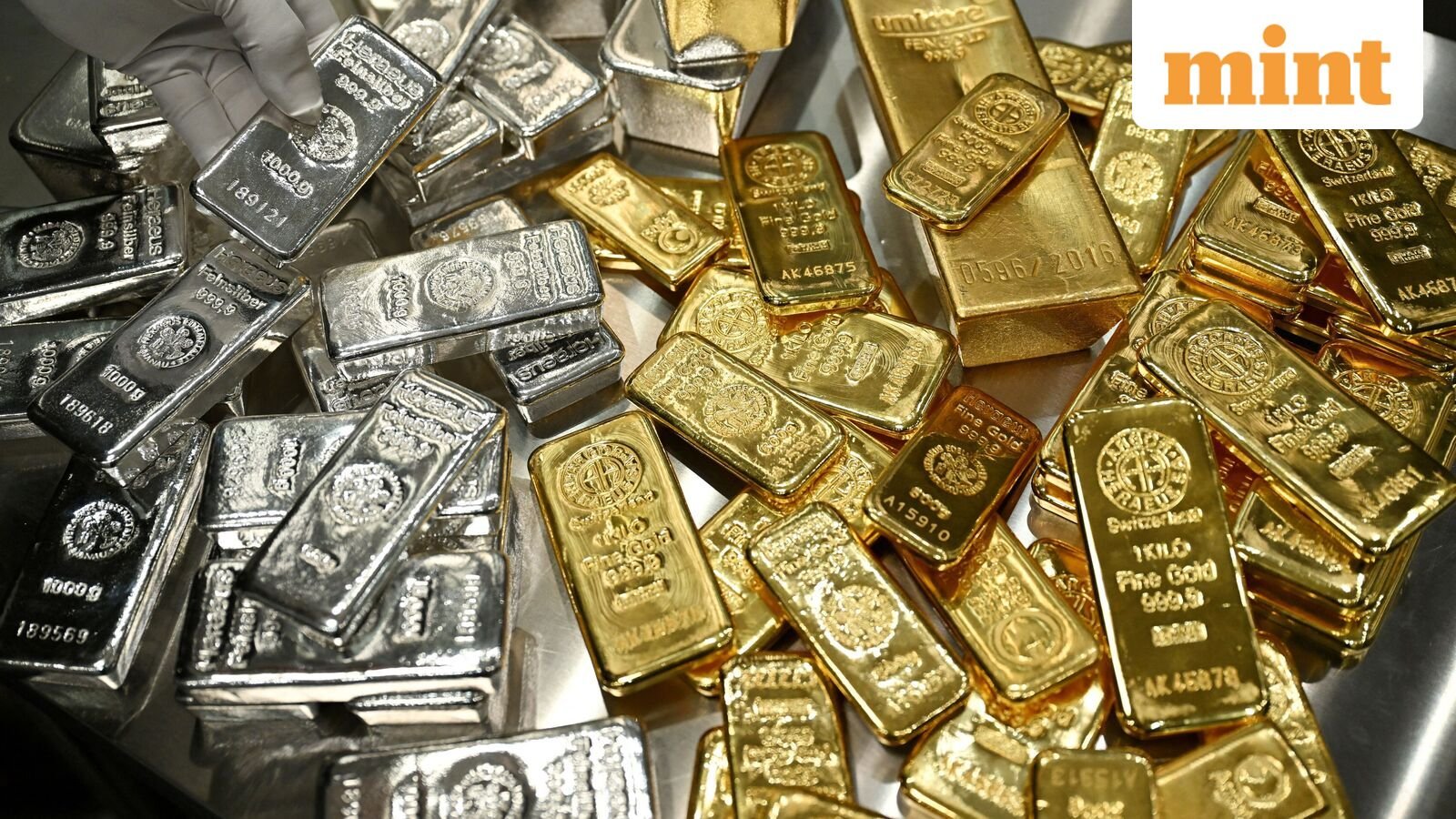 Gold, silver rates today: Gold rate holds above $5,000, silver price near $82. Where are metals headed?