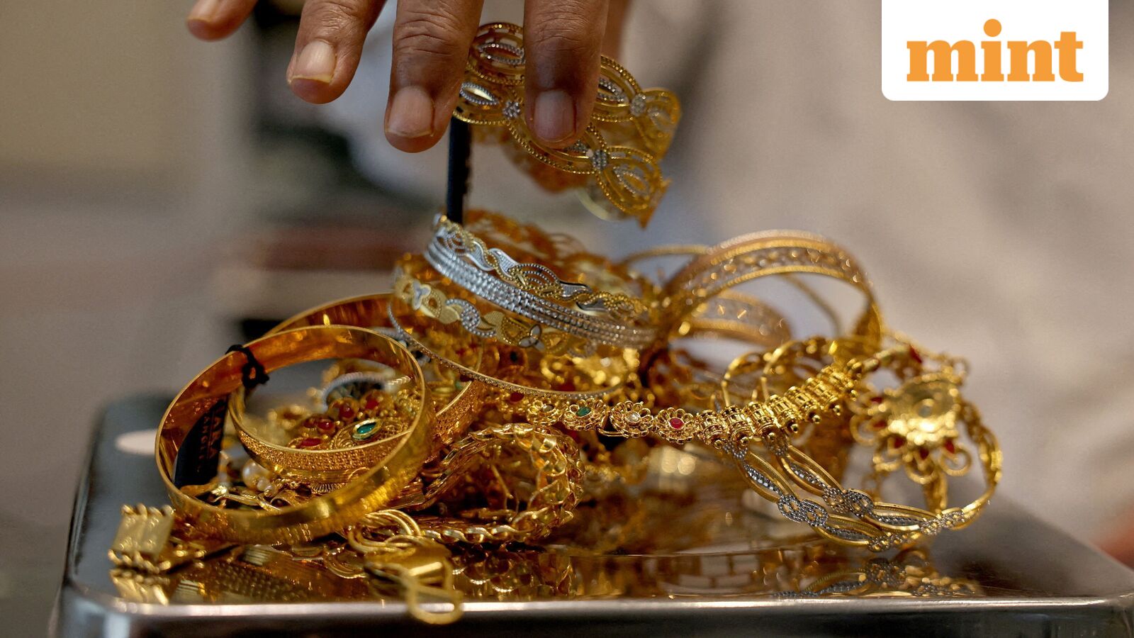 Gold, silver rates today: Gold prices climb to $5,200/oz, silver prices trade at $88. What's next for precious metals?