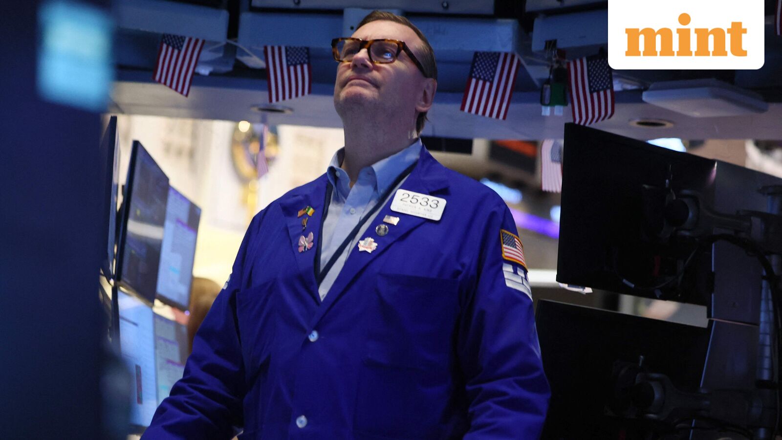 Wall Street surges ahead of Nvidia earnings, Axon jumps 17%, GoDaddy slumps 16%, Lowe's dips 4.2%