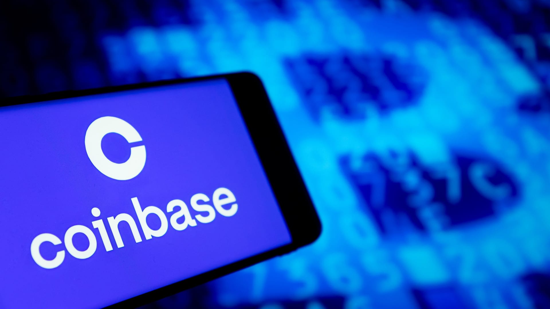 Stocks making the biggest moves midday: Coinbase, CoreWeave, KKR, Moderna, Brown-Forman & more