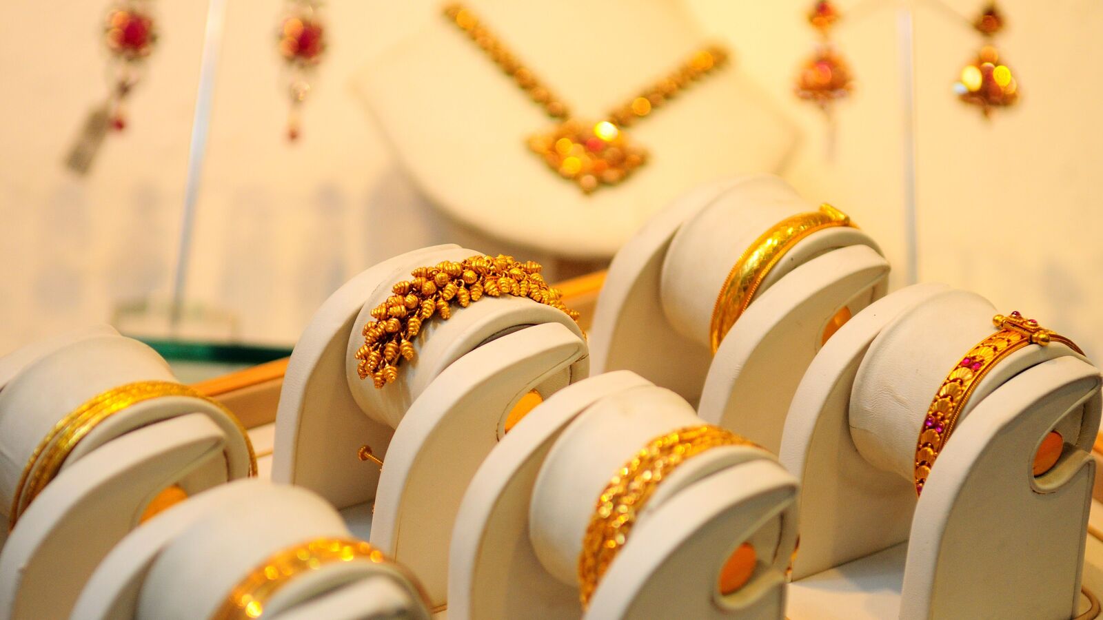Gold rate slips on MCX amid dollar's rise; geopolitical risks, Trump tariff uncertainties limit losses | Stock Market News