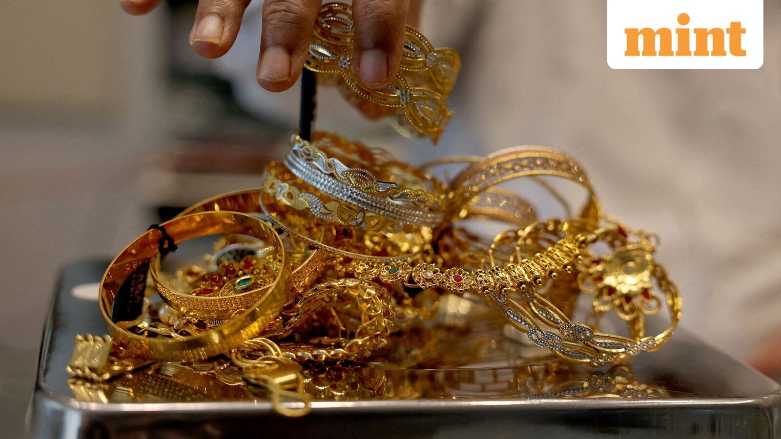 Why are gold prices rising but silver falling amid US-Iran war? Explained