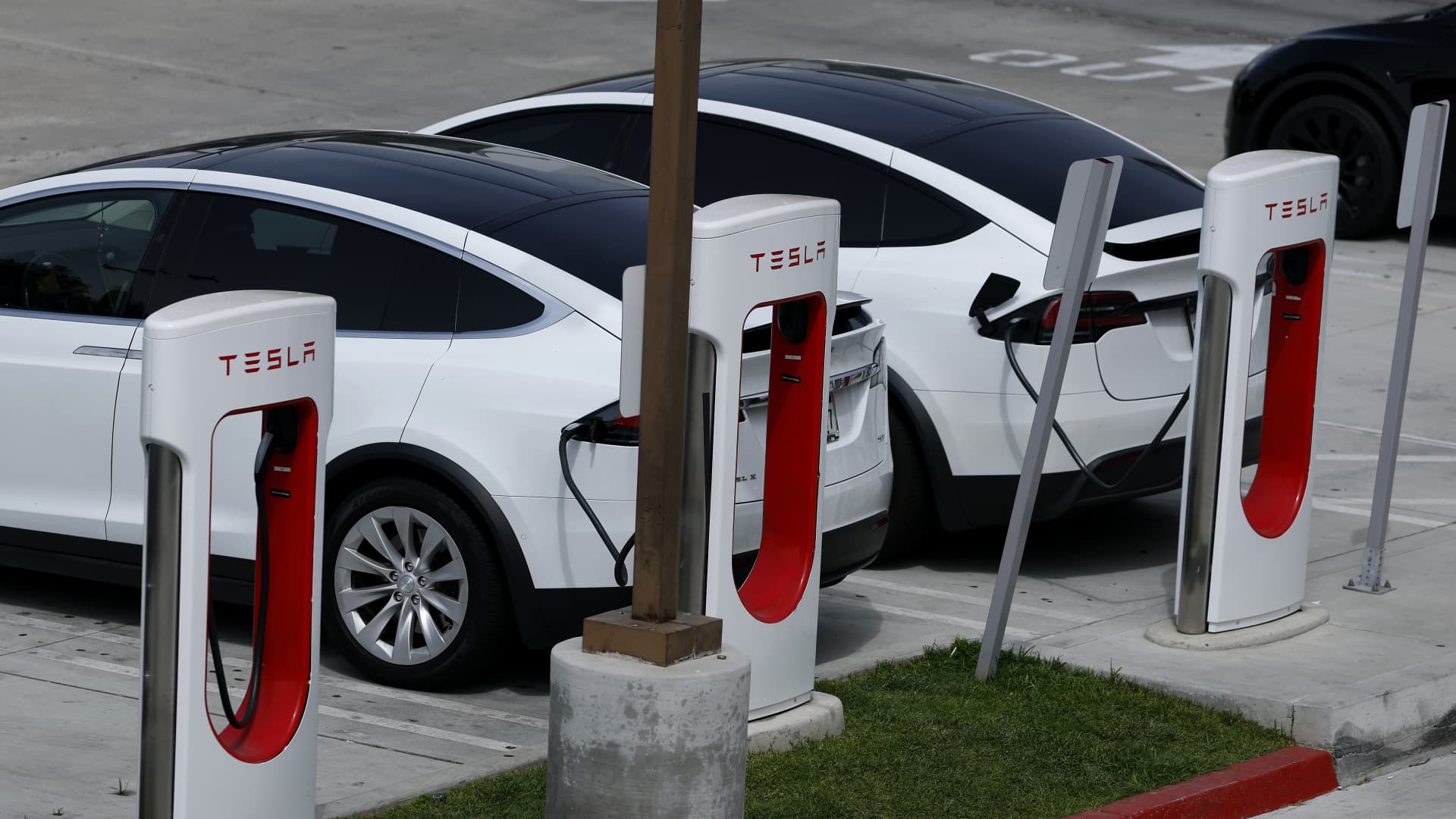 Stocks making the biggest moves midday: Tesla, NextDecade, General Motors, Delta Air Lines & more
