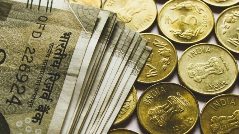Rupee opens 8 paise lower at 92.66 against US dollar as crude oil prices rise | Stock Market News