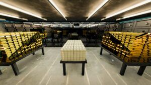 Crypto Firm Tether Buys 1-2 Tons of Gold Per Week