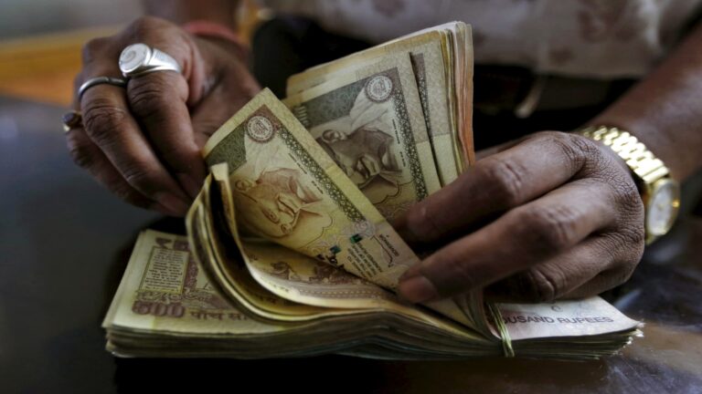 India scraps tax on overseas bond investors in bid to attract foreign capital and shore up the rupee