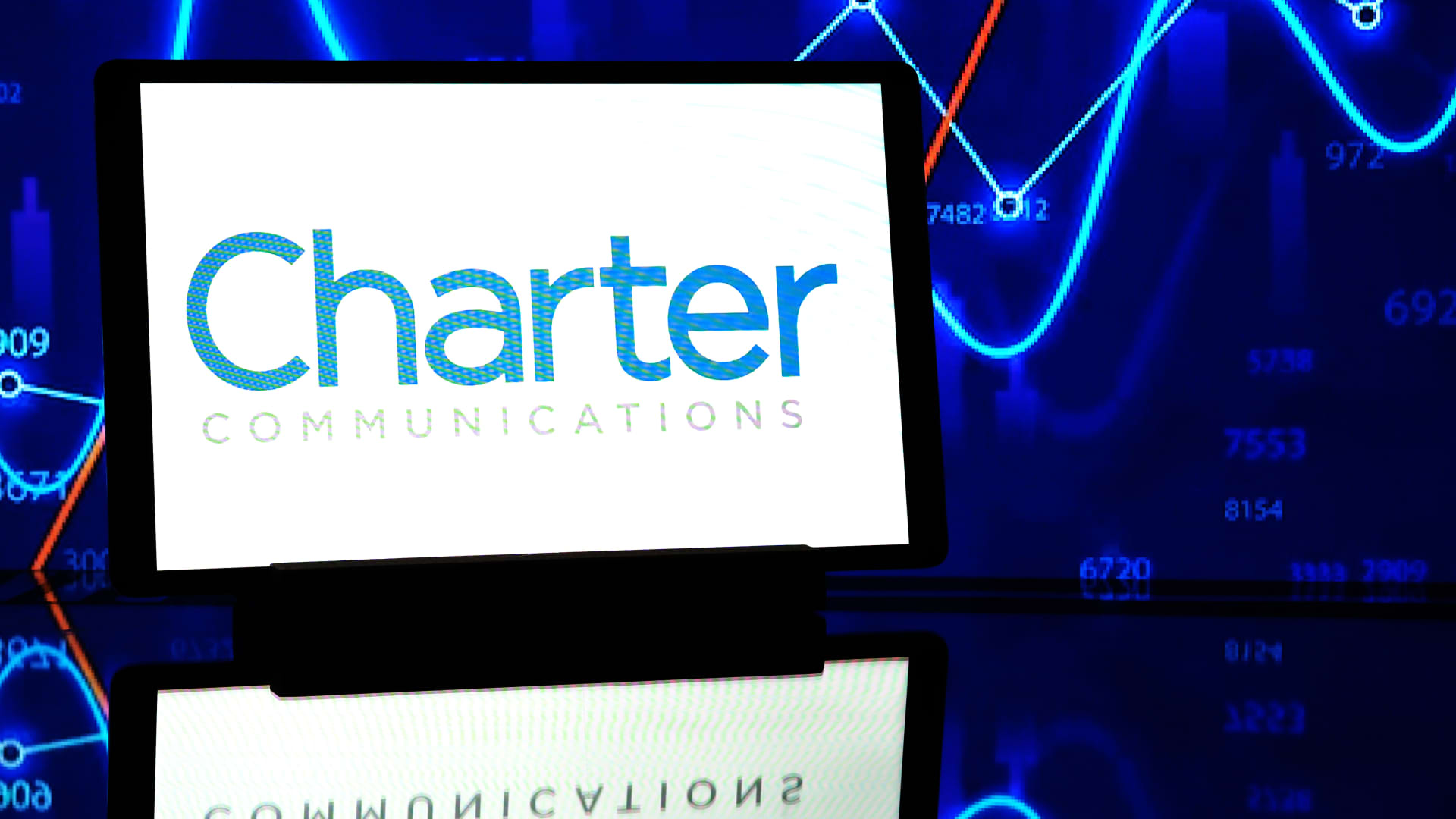 Stocks making the biggest moves premarket: Comcast, SpaceX, Charter Communications & more
