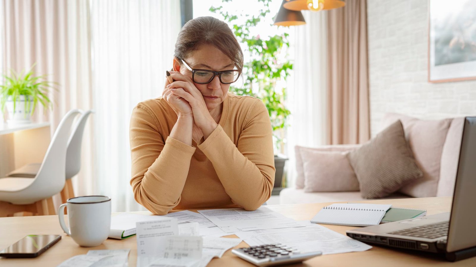 You could use your tax refund to pay off debt — but should you? 4 questions to ask yourself