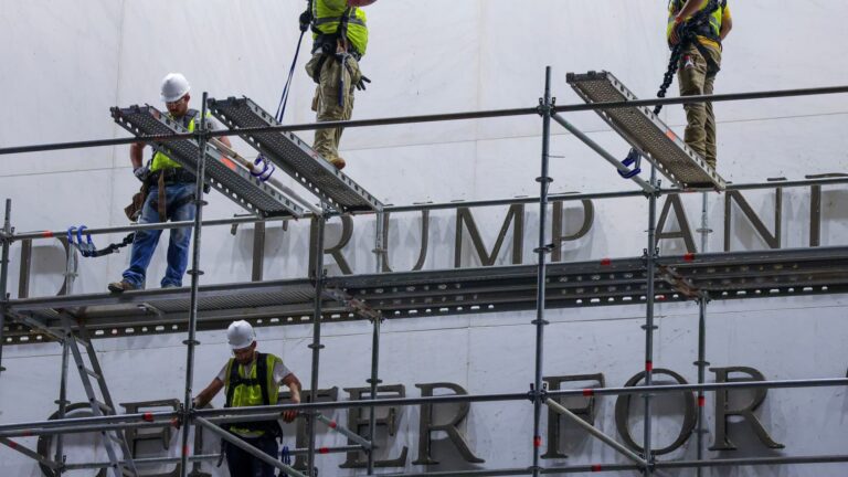 Workers begin removing Trump's name from the Kennedy Center, hours after a court-ordered deadline