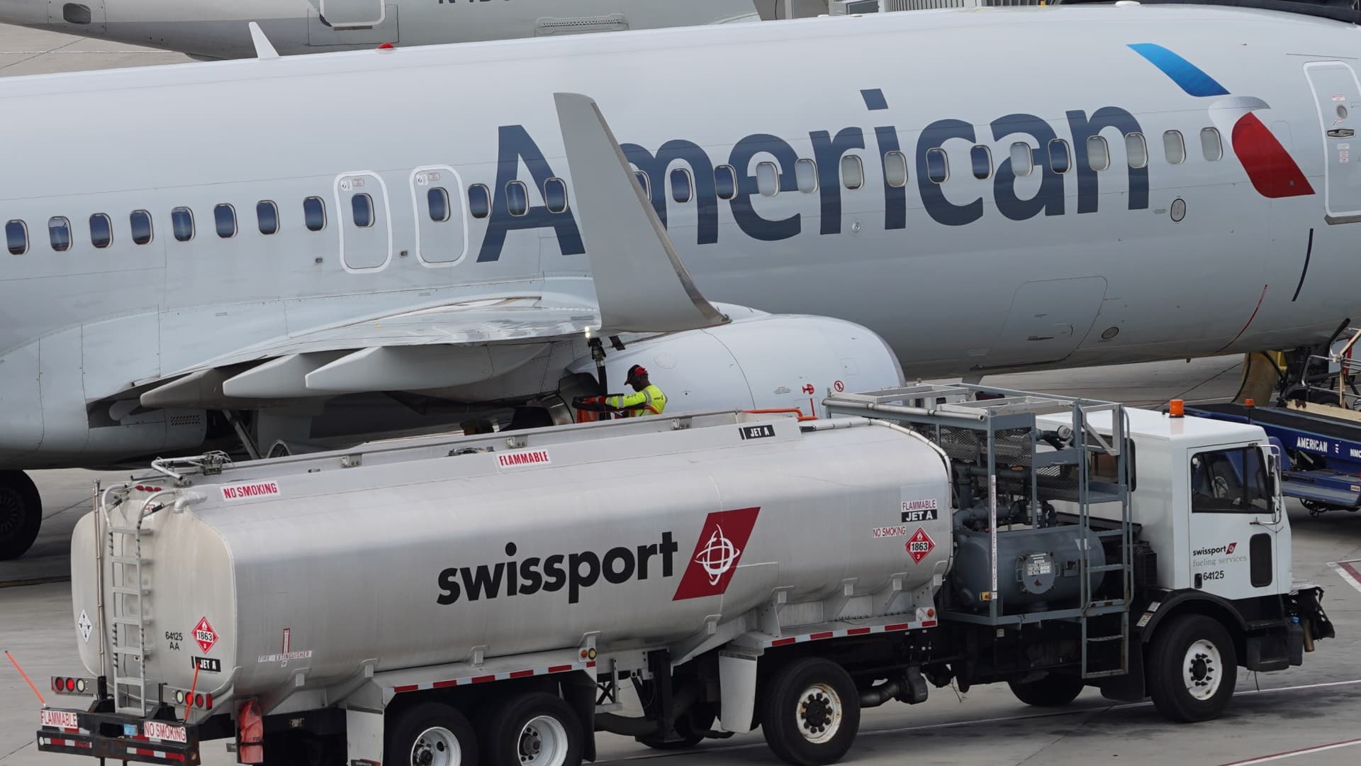 Stocks making the biggest moves midday: American Airlines, Coherent, SLB, Tesla & more