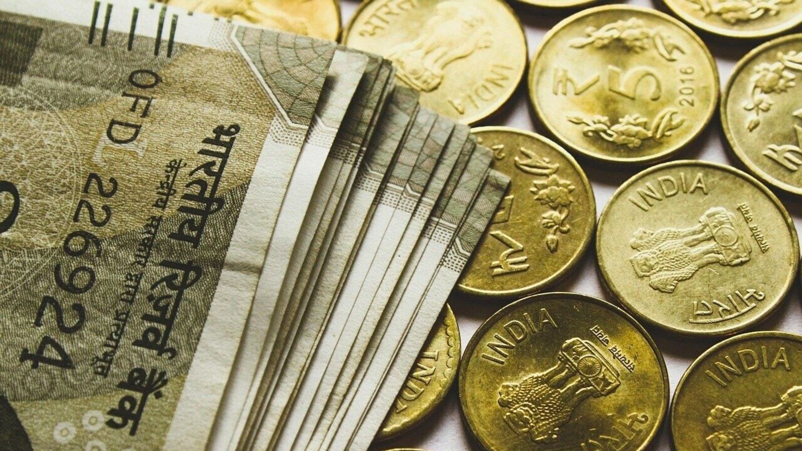 Rupee opens 10 paise lower at 96.34 against US dollar