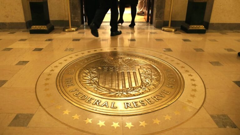 Treasury yields are little changed as investors await key inflation data
