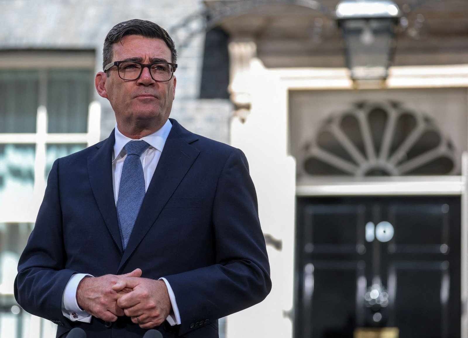Britain's newly appointed Prime Minister Andy Burnham looks on as he delivers a speech outside 10 Downing Street after taking office, in London, Britain, July 20, 2026.