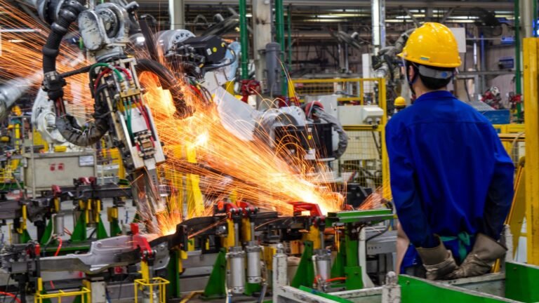 China's factory activity shrinks for second straight month, contracting less than expected