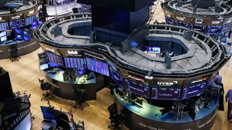 Wall Street climbs as crude oil prices plunge, Amazon jumps 3.8%