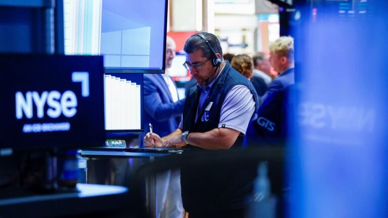 Wall Street slips ahead of inflation data, crude oil surges
