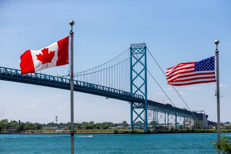Trucks traverse the Ambassador Bridge, a main trade route linking Canada and the United States in Windsor, Ontario, Canada July 5, 2020.