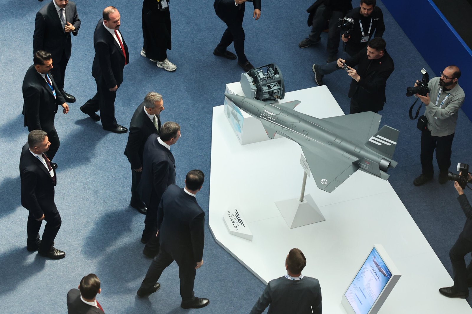 Turkish Vice President Cevdet Yilmaz looks on a model of Bayraktar drone during the Defence Industry Forum at the NATO Summit in Ankara, Turkiye on July 7, 2026.