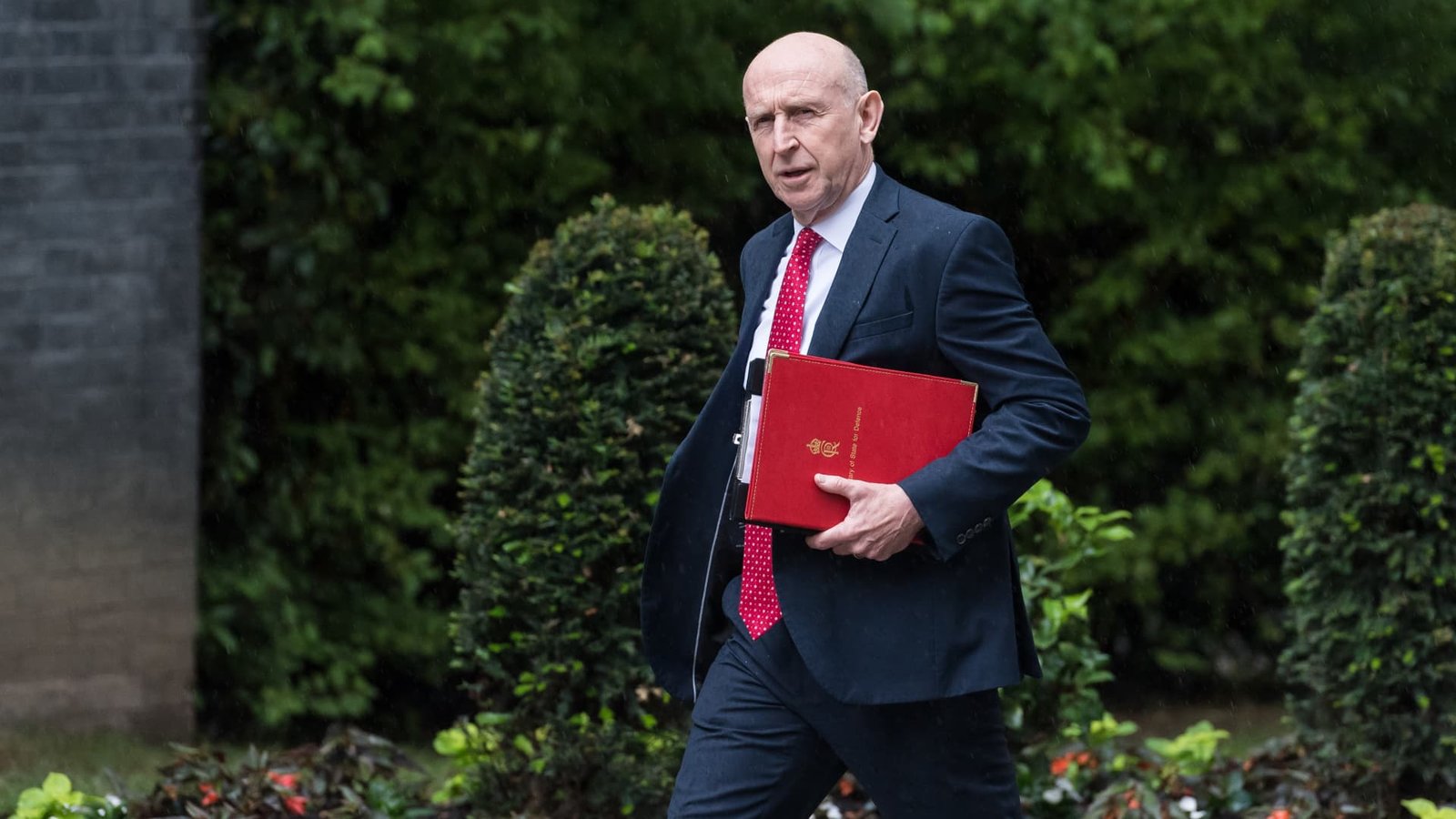 The UK cuts energy bills, taxes banks and boosts defense in high-stakes budget