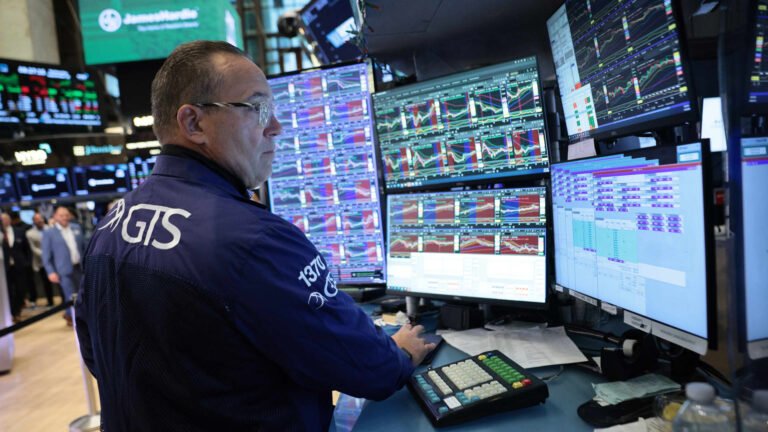 U.S. Treasury yields inch lower as investors await key inflation report