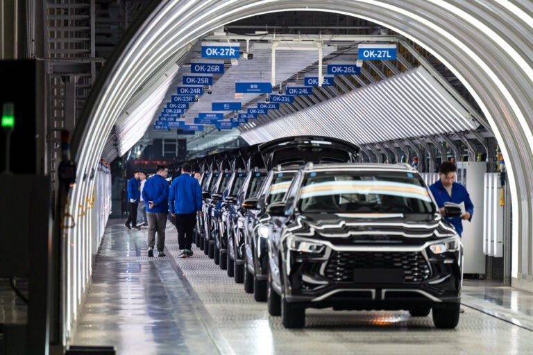 Electric vehicles on the assembly line at the BYD Co. factory in Zhengzhou, Henan province, China, on Wednesday, Nov. 5, 2025.